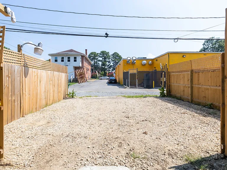 There is dedicated parking area behind the house off the alley.