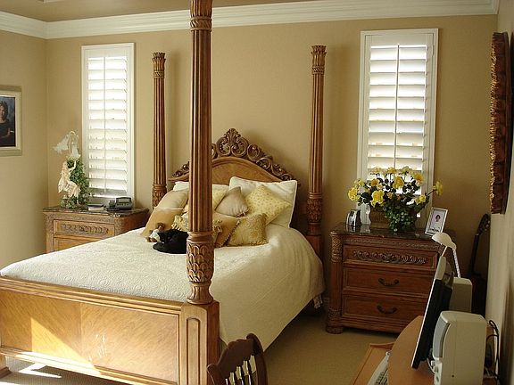 Master Bedroom that overlooks the pool with incredible sweeping views