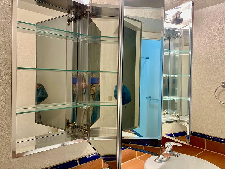 mirrored medicine cabinet above bathroom 1 double vanity