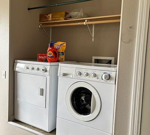 HE washer and dryer are elevated.