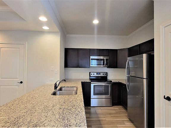 4th image of 6327 Melanzane Ave Unit 4