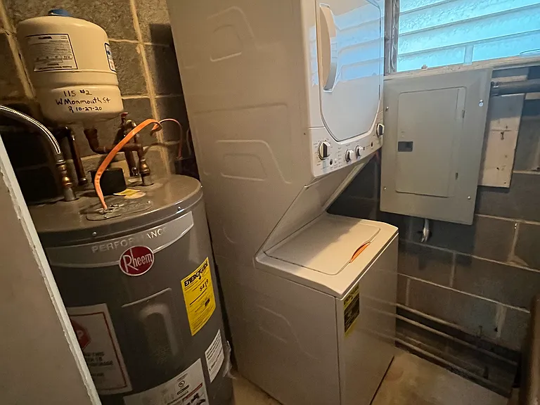Stacked washer and dryer, new in 2023