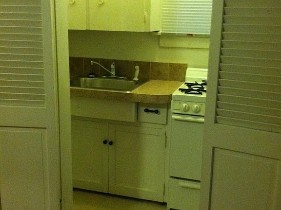 gas stove, galley style kitchen
