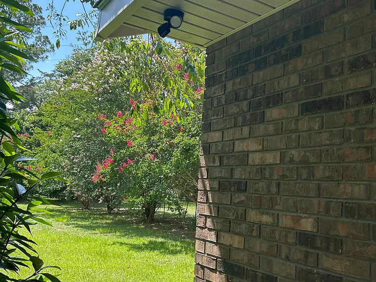 Flood lights on all 4 corners of house for safety and outdoor lighting.