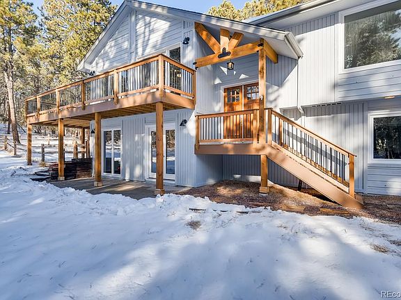 Beutiful entry with double wood doors