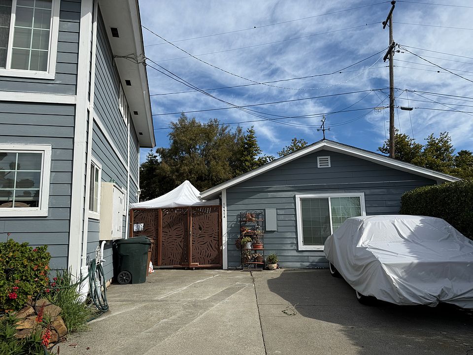 Main home on left, one off-street parking spot in front of the apartment on the right. Trash pick up is included in rent.