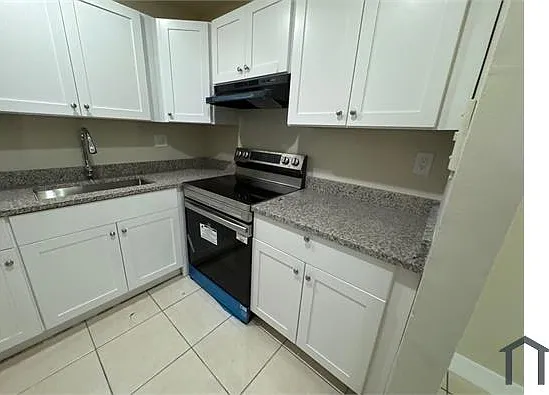 201 NW 32nd Ct #104