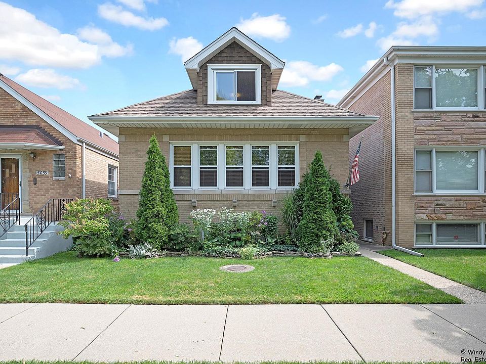 1st image of 5057 N Menard Ave