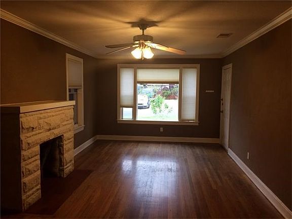 View from kitchen into the living room and front door.
