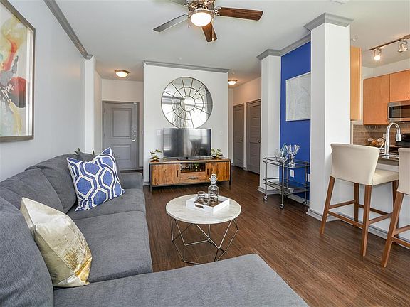 Spacious Living Room with Wood-Inspired Flooring