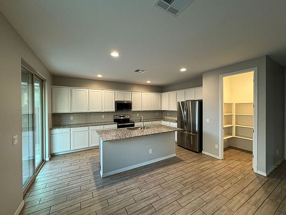 2nd image of 9353 E Saturn Ave