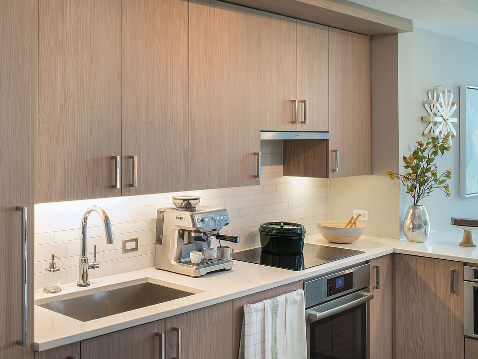 Modern kitchens featuring Bosch and Thermador appliances, including paneled refrigerators and dishwashers
