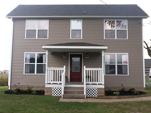 Front of house with small porch