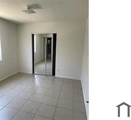 10026 S San Pedro St — Photo 7