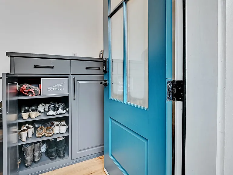 Built in shoe shelf and mud area bench
by entrance