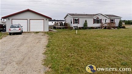Front yard and garage/driveway