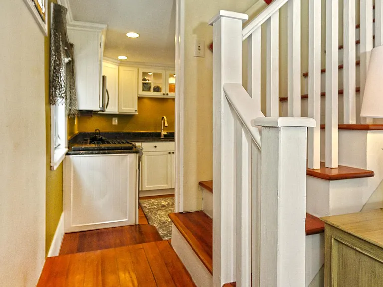 Double sided entry to staircase.