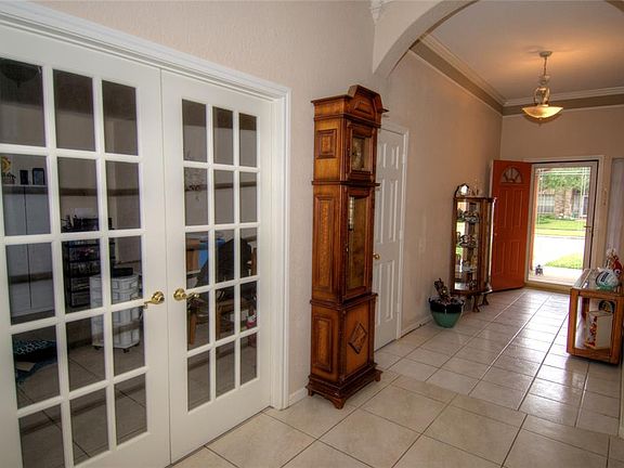 The study/formal dining room features french doors and is just off the family room and has a door adjoining the kitchen also.