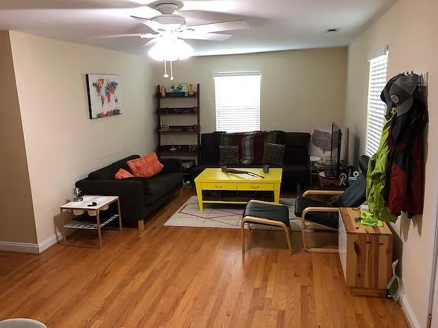 Spacious living room with hardwood floors.