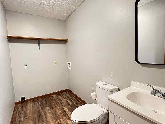 BATHROOM ON MAIN LEVEL WITH LAUNDRY HOOKUPS