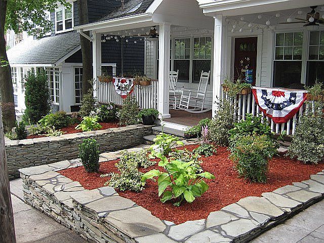 Front porch, new stone walls and land scaping