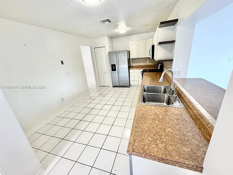 12695 SW 144th Ter — Photo 35