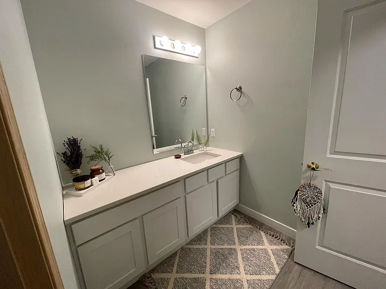 Full bathroom (upstairs, guest bathroom). Newly renovated bathroom with new vanity and flooring.