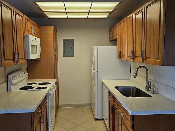 Upgraded cabinets, countertops, and appliances