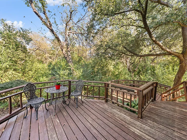 Two decks overlook creek and passing wildlife