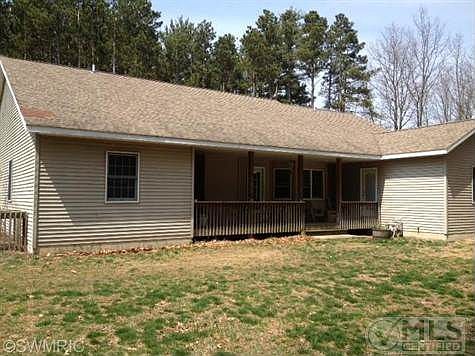 Back of house showing covered porch