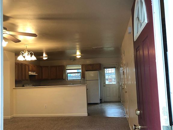 A welcoming great room opening up to a large kitchen.