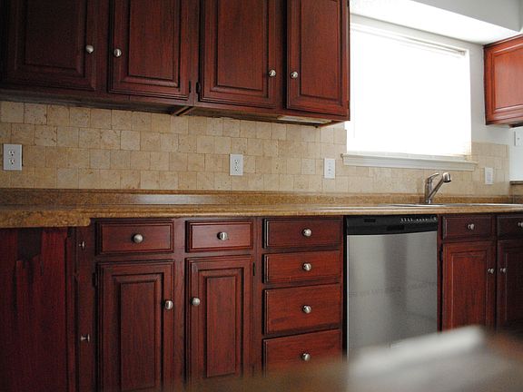Refinished Cabinets, new dishwasher, new Countertop, new backsplash