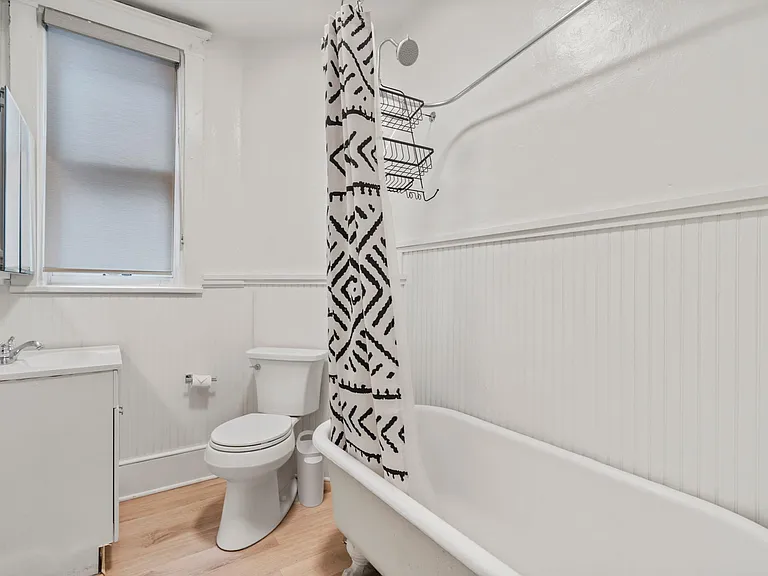 Bathroom with antique bathtub