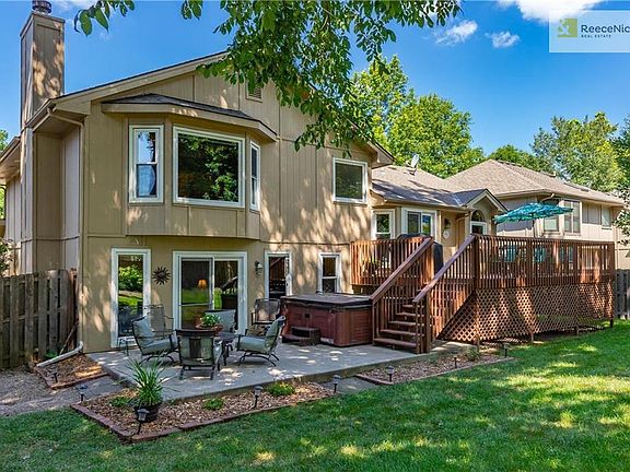 Large 24 x 14 Deck Overlooking a Manicured Yard and a 24 x 14 Patio
