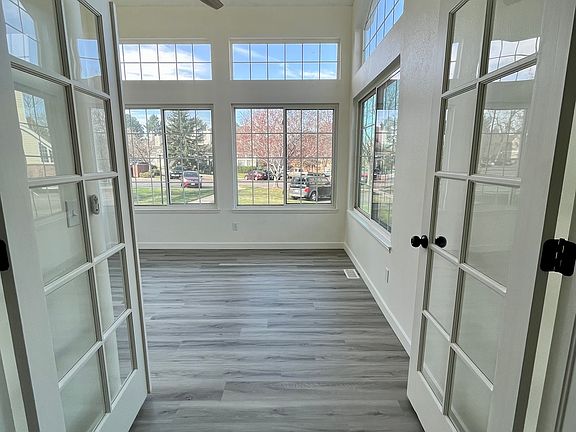 2nd bedroom or office room, lots of windows and natural light.