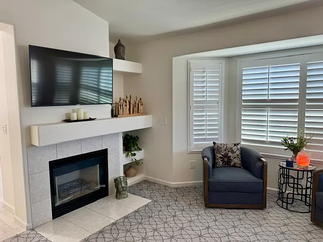Primary bedroom fireplace, sitting area