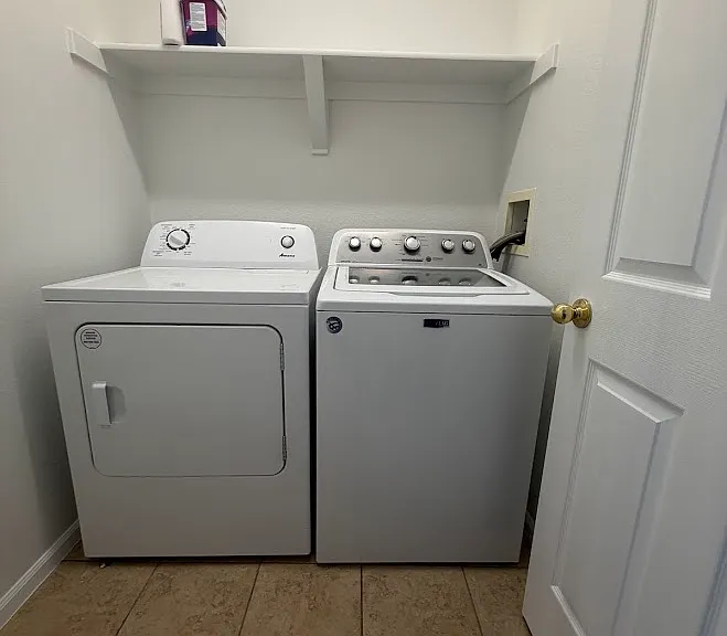 Laundry room on the second floor; right by the rooms!