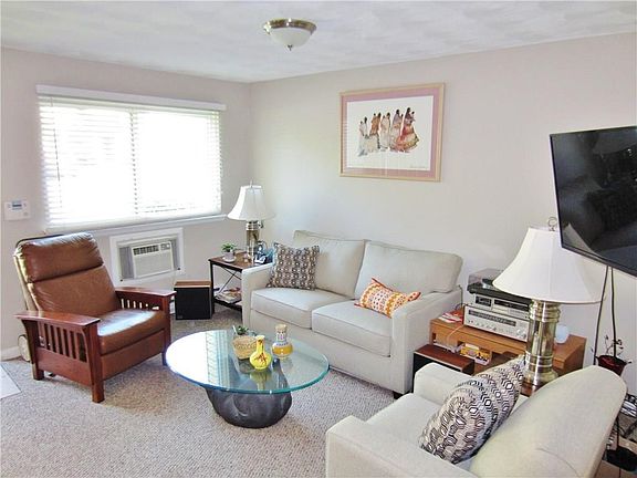 Spacious Open Floor Plan! This unit was renovated under 2 years ago. new paint, carpet and Kitchen Appliances!