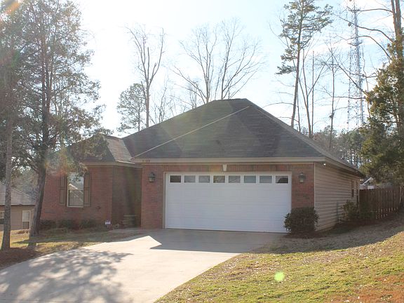 Brick front with  (zero maintenance) vinyl on other sides!!