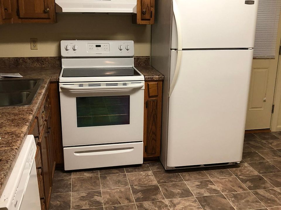 kitchen includes microwave, fridge, dishwasher and stove