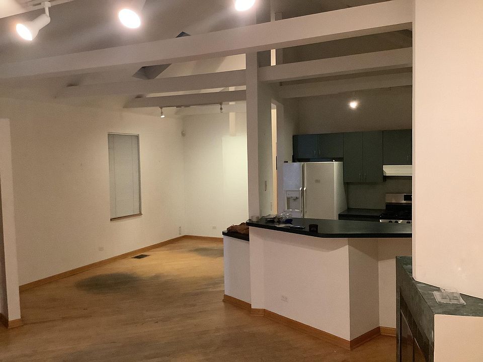 Kitchen/great room/dining area - vaulted ceilings, sky lights_ updates in progress: newly refinished hardwood floors, new countertops, stainless appliances, freshly painted!