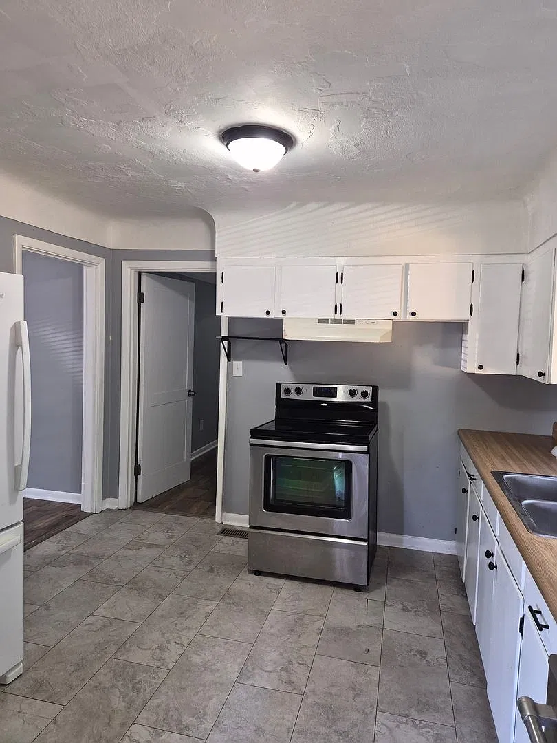 4213 Oakland Terrace N: Renovated 3BR Home with Fenced Yard, Carport & Storage Shed — Photo 4