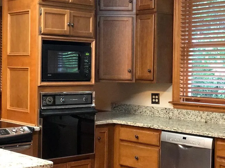 Microwave, wall oven, & slide in stove/oven, dishwasher, trash compactor
Rrefrigerator NOT included. Granite countertops hard tile floors. LOTS of Storage and counter top space