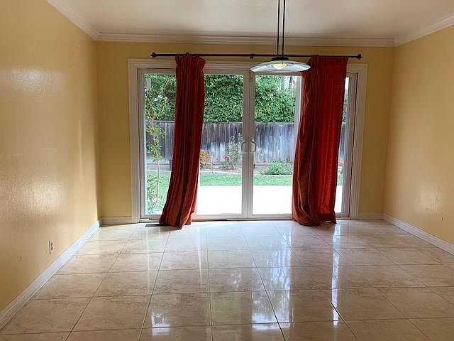 Dining Area with double pane sliding door opens to the backyard