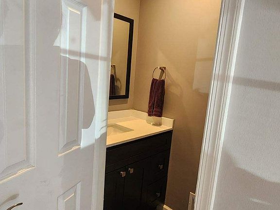 Half bathroom between family room and kitchen on 1st floor