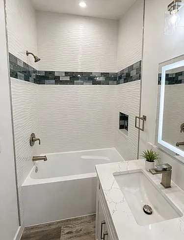 Bathroom- Deep Soaking Tub, Light-Up Mirror & Vaulted Ceiling