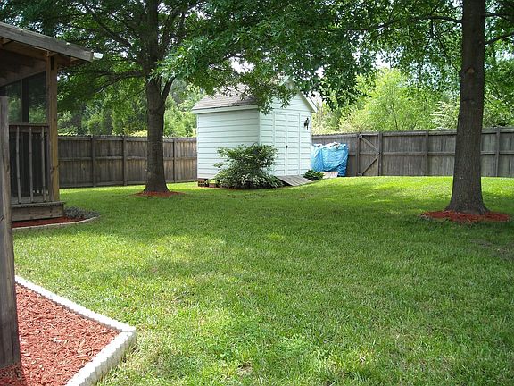 Back yard with storage building