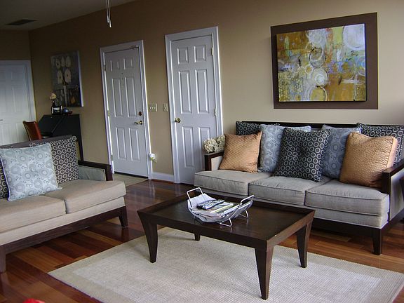 Hardwood floors in large, open living room.