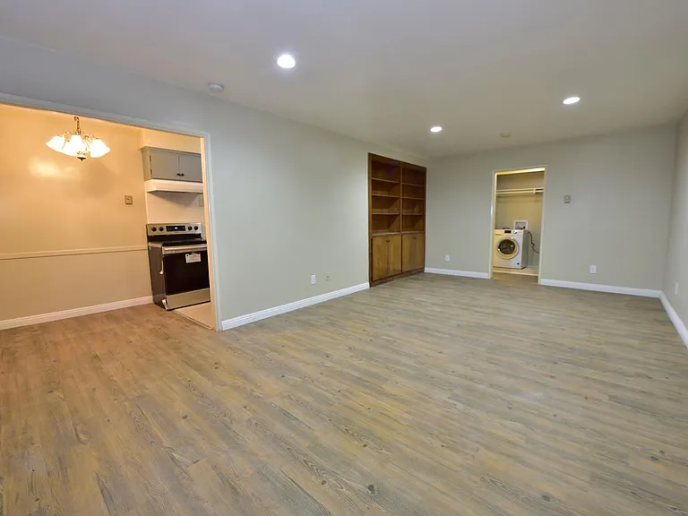 Fully Updated unit with In-unit Laundry, built-in cabinet, SS kitchen appliance + quartz countertop