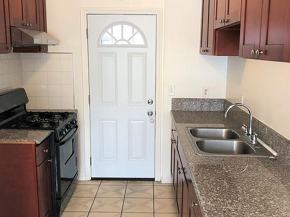 Recently updated kitchen includes abundant cabinet space and easy to clean granite counter tops.